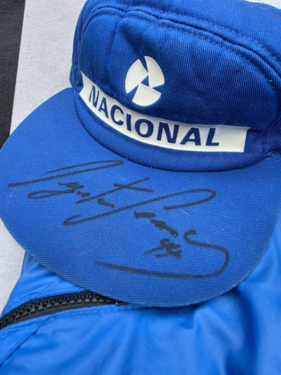 SOLD: Ayrton Senna Race Worn NACIONAL Cap + Lotus Team Jackey from the Nigel Stepney Collection