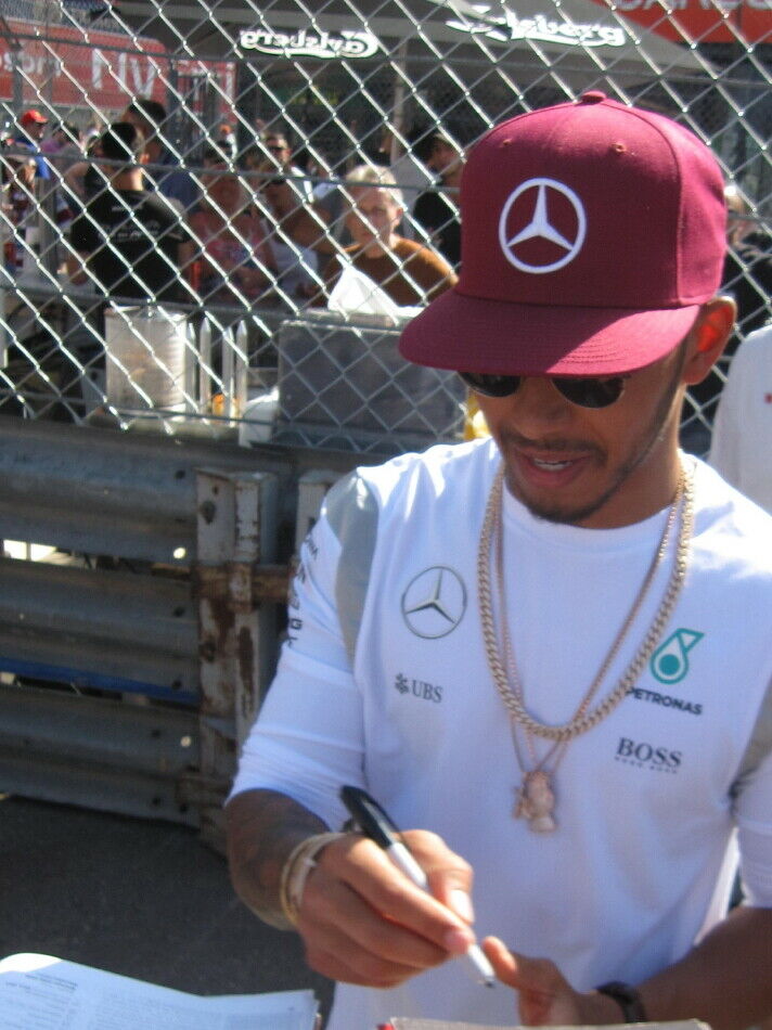 Lewis Hamilton signing memorabilia